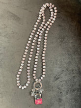 Shimmery Rose-Colored Beads with Silver and Hot Pink Charms